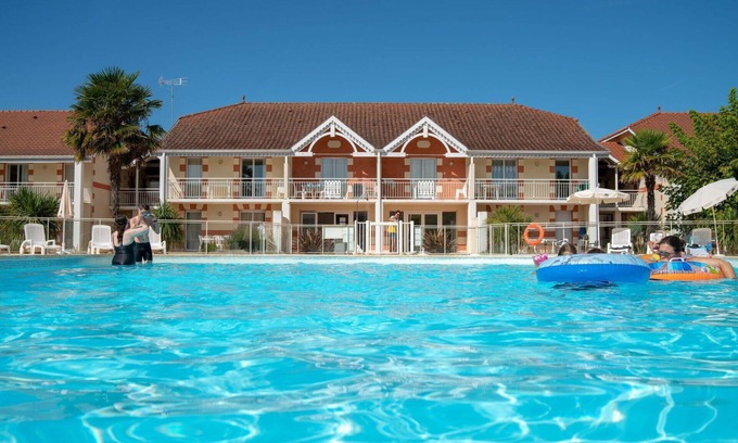 Le Verdon-sur-Mer Apartamento | Bonito apartamento para 8 personas con piscina, WIFI, TV, terraza, mascotas permitida y aparcamiento