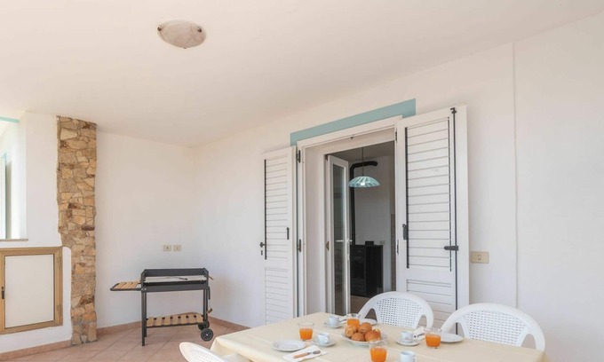 Pittulongu Apartamento | Nice apartment for 4 guests with TV, terrace, pets allowed and parking