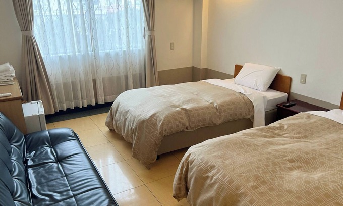 Nago Hotel | Nonsmoking Up to 3 people spacious twin room f / Nago Okinawa