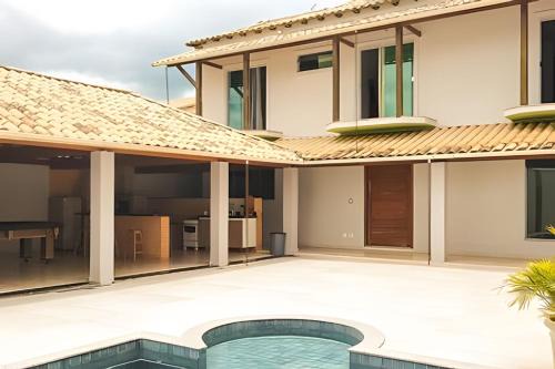 Bom Pastor Casa | NossoApê Guarua: Piscina | Churrasqueira | Ar-condicionado