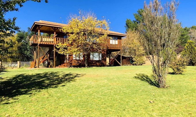 Clarens Cabina | Nougat Cabin. Luxury log cabin within walking distance of shops and restaurants.