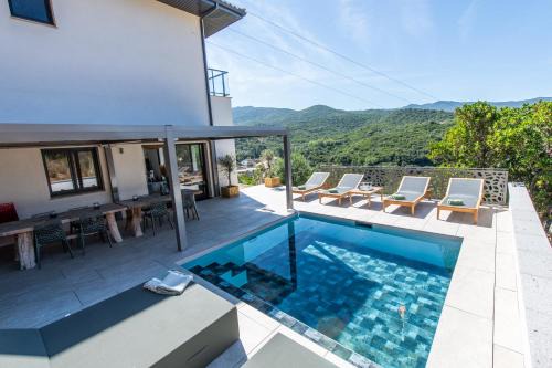 Molini Villa | NOUVEAU ! Maison de standing avec piscine et climatisation entre mer et montagnes