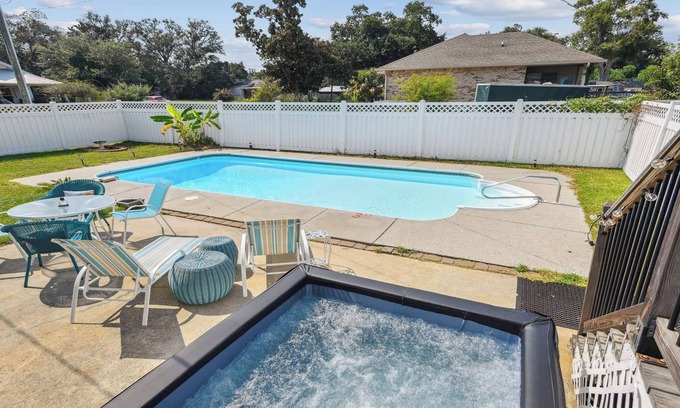 Gulfport Cabaña | Oak trees, Heated Pool/Spa oasis & walk to beach! Drive to downtown 3 min!