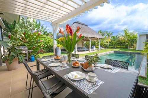 Grand Gaube Apartamento | OCEAN beachfront flat, 3 bedrooms en suite, Grand Gaube
