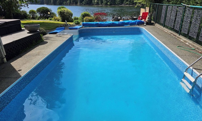 North Oyster Villa | ocean dock and pool art villa