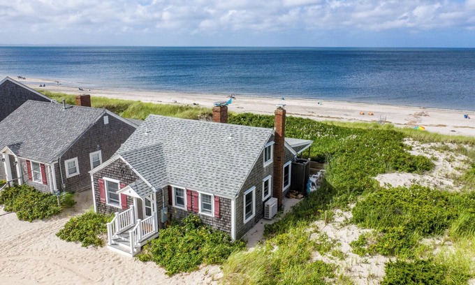East Sandwich Cabaña | Ocean front oasis nestled into the dune on a private East Sandwich beach.