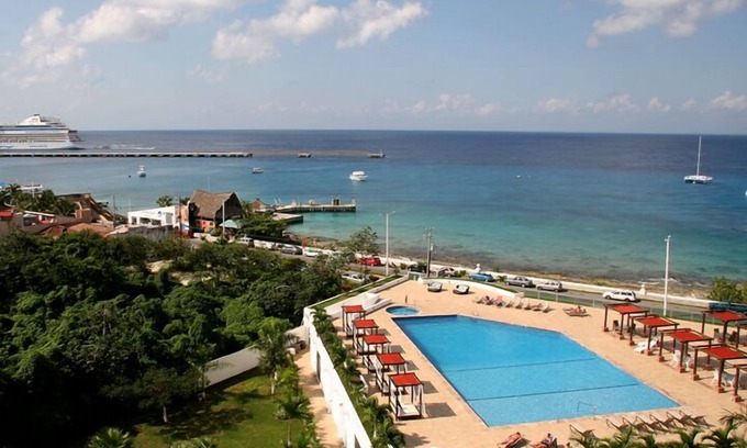 Cozumel Condominio | ¡Fechas de verano todavía abiertas! Con vista al mar, el único condominio de lujo de 4 habitaciones en Palmar