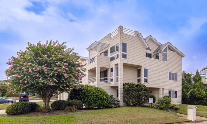 Croatan Beach Casa | Ocean-view home that is within a 2 minute walk to the beach w/rooftop deck