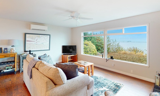 Port Angeles East Casa | Oceanfront, bluff-top home with Ediz Hook view, prime location, fireplace