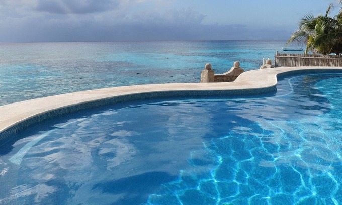 San Miguel Condominio | Condominio frente al mar en el océano más azul de la isla de Cozumel