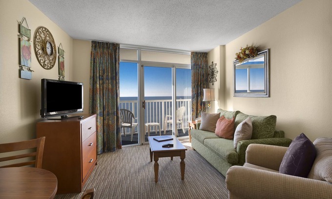 Arcadian Shores Complejo | Suite King frente al mar con balcón privado + privilegios oficiales de alquiler en el lugar