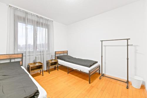 Ofterdingen Apartamento | OF02 Komfortables Apartment für Monteure und Teams - 4 Schlafzimmer mit 10 Einzelbetten - LS Crewcomfort - weitere Unterkünfte verfügbar