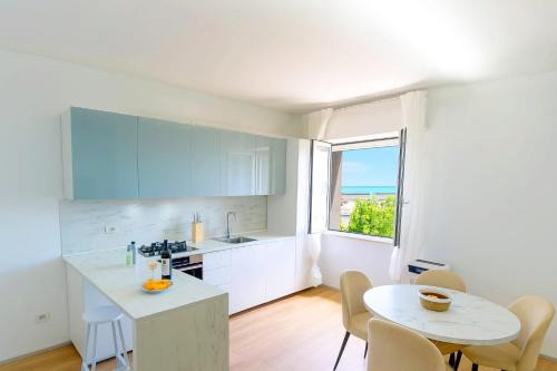 Casabianca di Fermo Apartamento | OFFER AGOSTO - Sulla Spiaggia Parking - AC & WiFi