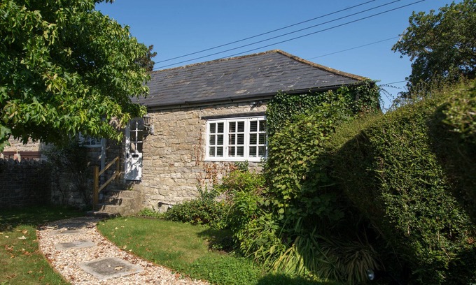 Mudford Casa | Old Stone Gardeners Cottage en Somerset con un tranquilo jardín apartado