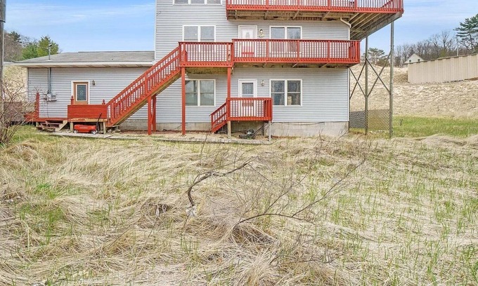 Shelby Casa | Only a 3 minute walk to a beautiful private Lake Michigan beach