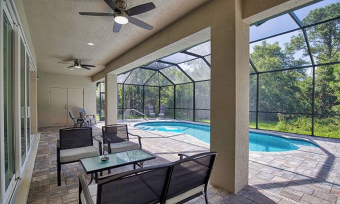 North Port Casa | Open Concept home with Heated Pool in peaceful North Port 3 Bdrm, 4 Bath + Den