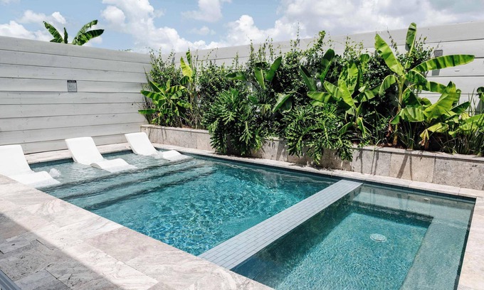 Faubourg Lafayette Hotel | Opulent Construction With Heated Pool + Hot Tub