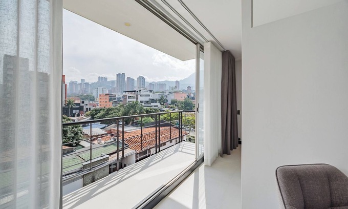 Patio Bonito Apartamento | Orange Suites 505