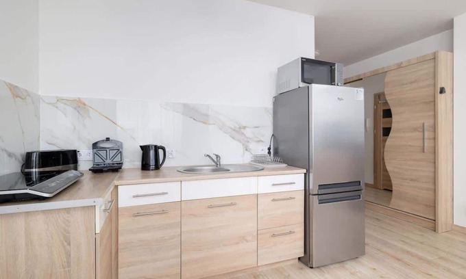 Wieliczka Apartamento | Os Szymanowskiego 18 Trendy Apartment Parking