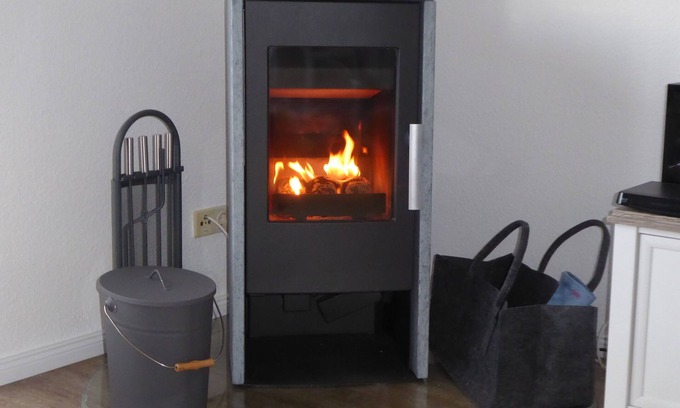 Wulfen Apartamento | Ostseebrise-Fehmarn: tiempo fuera del mar, con una chimenea de estilo rústico, a 400 m del mar