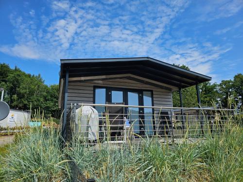 Gronenberg Casa | Ostseecamp Lübecker Bucht Ferienhaus "Beachhouse" mit kostenlosen Saunazugang