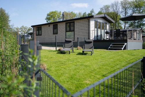 Gronenberg Casa | Ostseecamp Lübecker Bucht Ferienhaus "Buddha Beach"