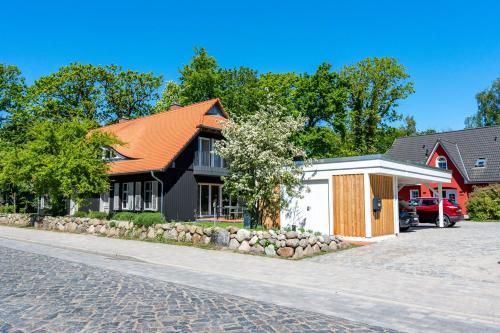 Born auf dem Darss Apartamento | Ostseedomizil "Ankerbuk", Ferienhaus Silberreiher