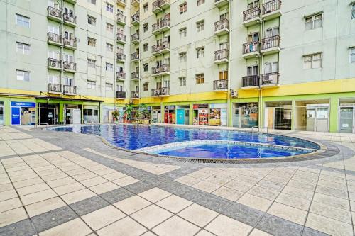 Bandung Hotel | OYO 93426 Metro Suites Apartment By Goodvibes
