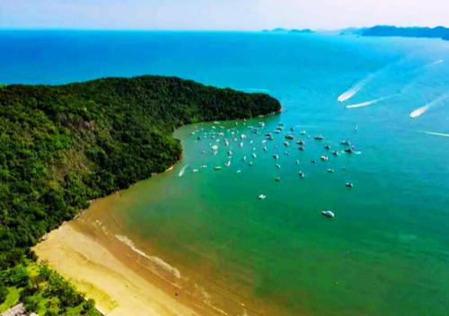 Indaia Apartamento | Pé na Areia, Conforto e Lazer em Bertioga SP