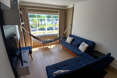 Embare Apartamento | Pé na Areia em Santos: Sol, Mar e Netflix