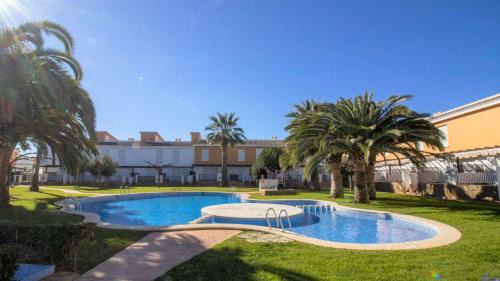 Alcossebre Casa | PALM BEACH 132 Adosado con jardin y piscina ALBERT VILLAS