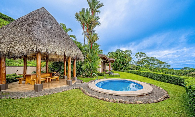 Islita Otro | Palm-lined oasis with mountain & ocean views, a pool, hammock, & soaking tubs