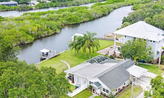 Tillman Casa | Palms Paradise. Heated Pool. Waterfront. Near Space Coast Beaches.