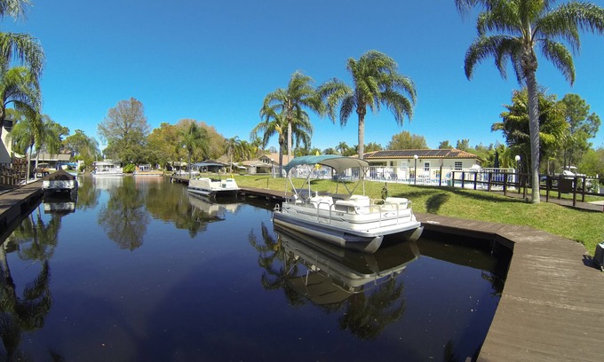 Palm Harbor Condominio | Frente de agua 'Paradise' Lake Tarpon Condominio con 19 'Barco