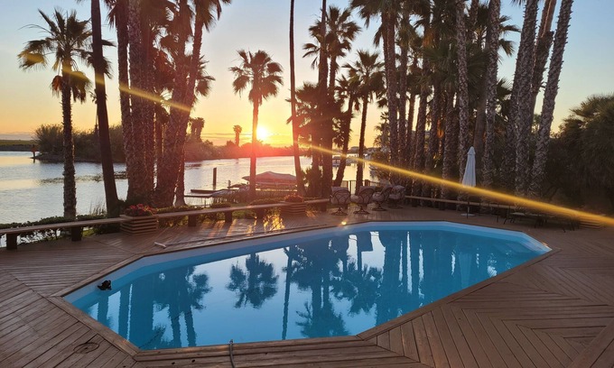 Discovery Bay Casa | Paradise Point. 1 minute to fast water and a beach! Pool, Spa, Dock. Sleeps 10
