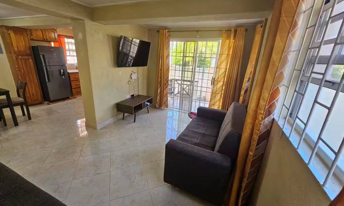 Charnocks Apartamento | Peaceful 2-bedroom downstairs apartment walking distance to the airport.