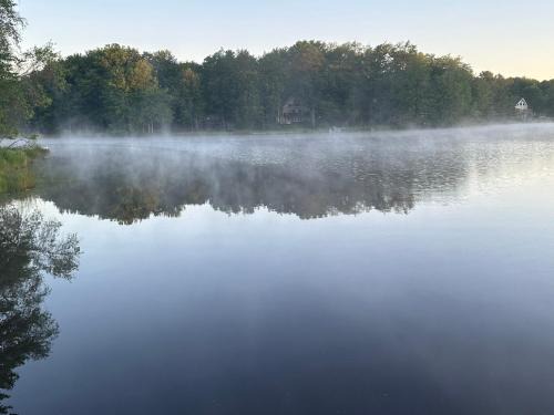 Pocono Lake Casa | Peaceful Pocono Lakefront, beach, pools, firepit, pets