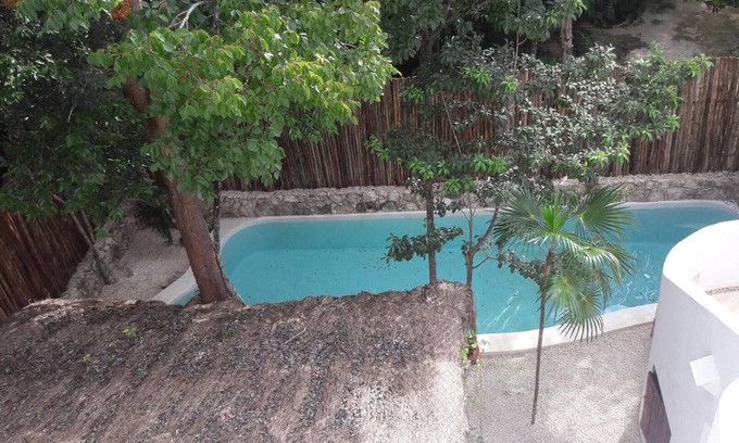 Chemuyil Apartamento | Ático en la jungla a 2 km de la playa.