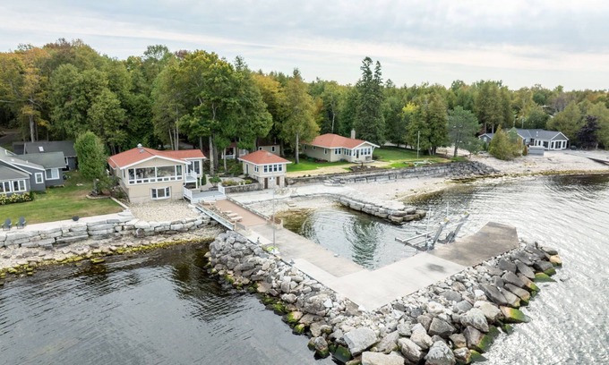 Egg Harbor Casa | Three Leaves Bayside Retreat in Egg Harbor-Waterfront Escape with Multiple Cabins, Sauna, and more!