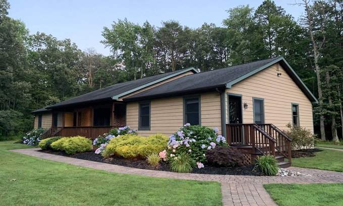 Dennis Cabina | Perfect getaway for large families who love the woods and beach!!