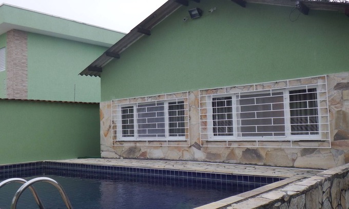 Jardim Santa Tereza Casa | Perfect with swimming pool, barbecue and 200m from the beach.