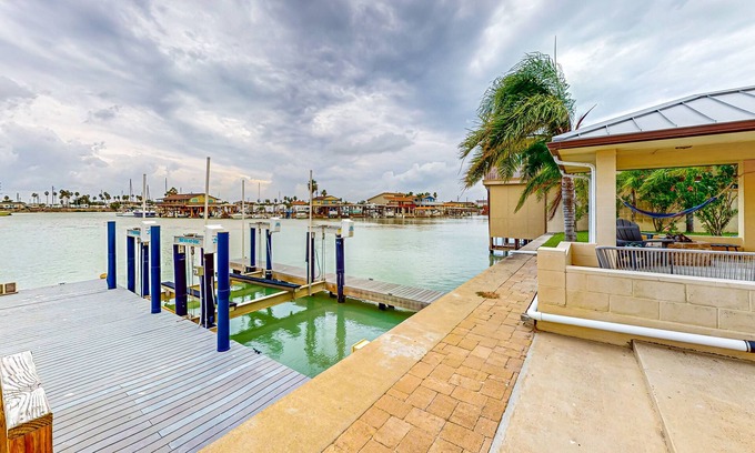 Port Isabel Casa | Perfectly located waterfront getaway with patio, grill, AC, & gorgeous bay views