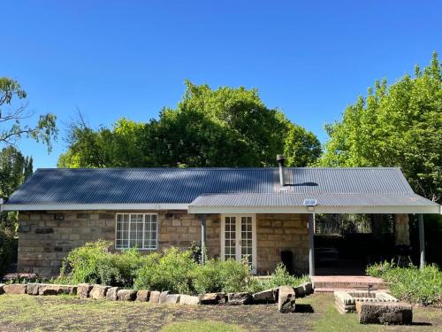 Clarens Casa | Periwinkle, Grove ,Acorn & Sage Cottages