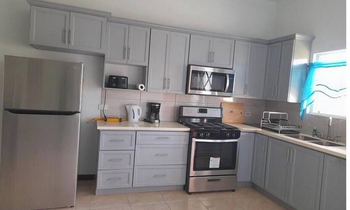 Sandy Point Town Casa | Periwinkles Cozy Retreat