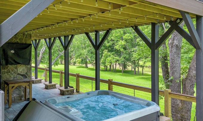 Lansing Casa | Luxury Riverfront Retreat - Game Room + Hot Tub + Lounge & Bar + Chef's Kitchen