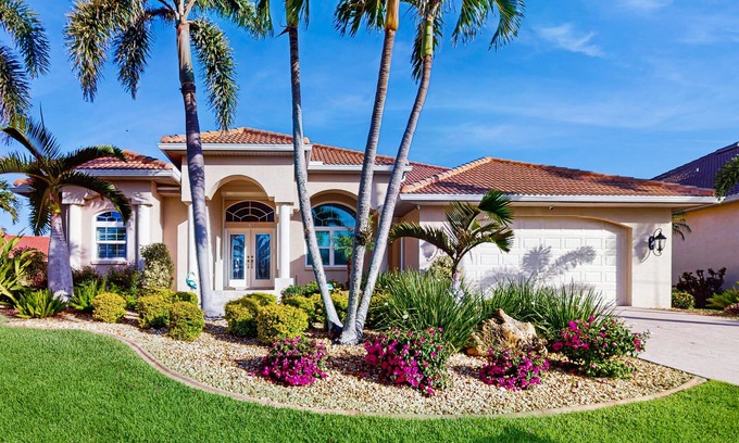 Burnt Store Isles Casa | Pet friendly, waterfront house with private pool, lanai, and arcade games