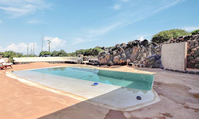Pantelleria Casa | Picturesque vacation home with pretty pool and panoramic sea view.