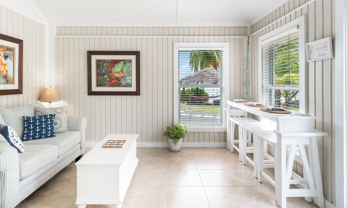 Breakers Casa | Piece of Mine Yellow: Beach Cottage on 200-feet of Shoreline w/ Reef Snorkeling + Seaside Hammocks
