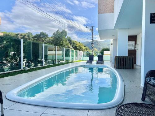 Governador Celso Ramos Apartamento | Piscina! Apto na praia de Palmas! PF01I