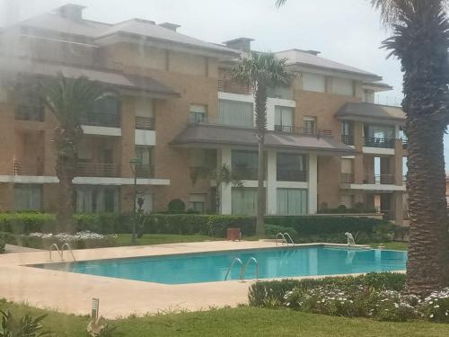 Oulad Khallouf Apartamento | plage des nations bouknadel